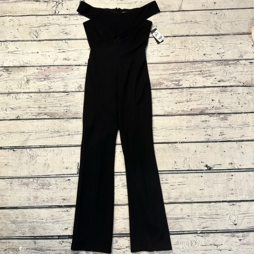 NWT Guess. Off the shoulder jumpsuit keyhole.